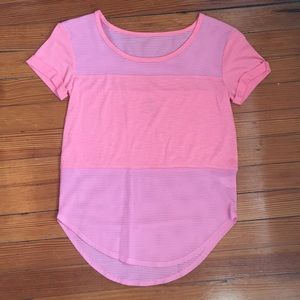 A short sleeve pink shirt